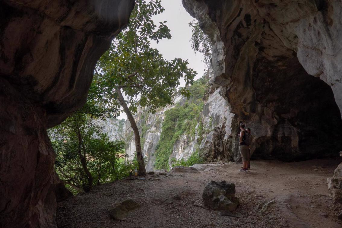 Exploring Kampot Caves - Kampong Trach cave temple in limestone mountains