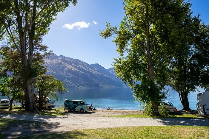 A self contained campervan New Zealand at Kingston Freedom camping by the lake