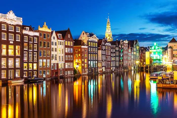 Netherlands travel guide recommendations - Amsterdam at nights, beautiful lights on the waterways of the city